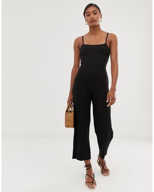 Stradivarius – Einfarbig schwarzer Jumpsuit mit schlichter Schleife