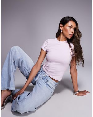 GOOD AMERICAN T-shirt raccourci super stretch en coton - bonbon - Rose