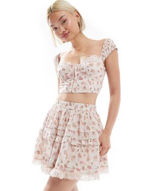 Love Triangle Cropped Korsettop Met Kanten Afwerking En Bloemenprint - Wit