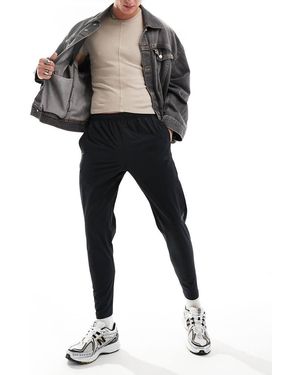 New Balance Tenacity Stretch Woven Pant - Black