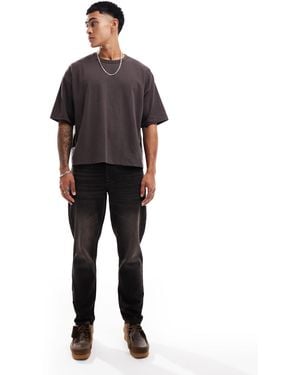 ASOS – schmal zulaufende jeans - Schwarz