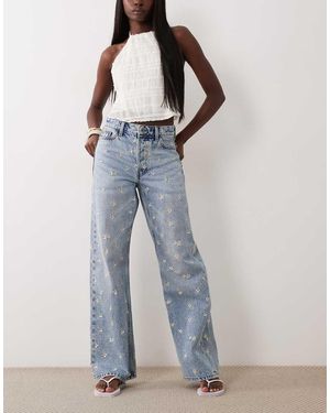 River Island Vaqueros Azules De Corte Recto Holgado Con Lavado Medio Y Bordado De Margaritas
