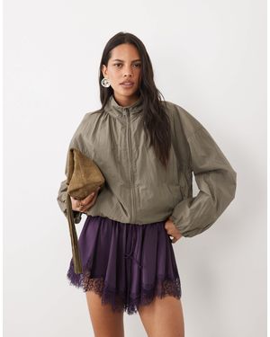 ASOS Short fluide en satin à taille à cordon avec bordure en dentelle - Marron