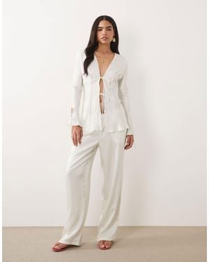 Lioness In Bloom Satin Low Rise Relaxed Leg Pants In (part Of A Set)-white