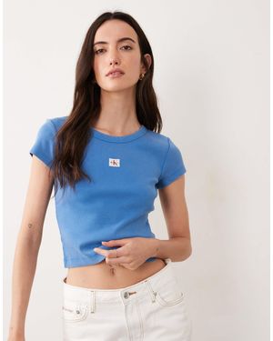 Calvin Klein Oberteil mit gewebtem label und rundhalsausschnitt - Blau