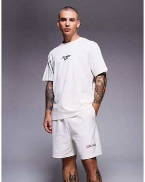 Calvin Klein Pantaloncini Premium Color Panna Con Logo Cucito - Bianco