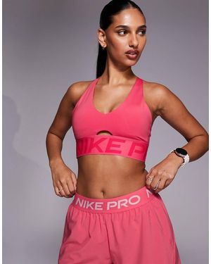 Nike Sujetador Deportivo Escotado De Sujeción Baja Dri-Fit Indy De Nike Pro Training - Rojo