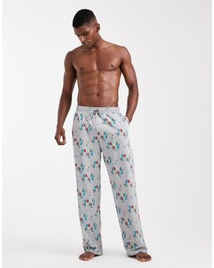 ASOS Lounge Bottoms With Christmas Feliz Navidad Graphic - White