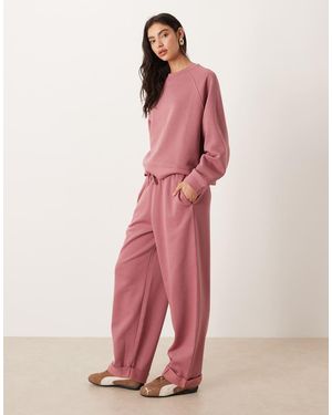 ASOS Oversized Brushback Joggers With Turnback Hem Detailing - Pink