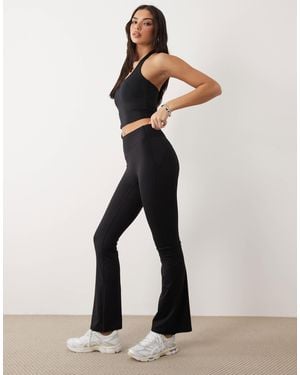Gina Tricot Mix And Match Flare Yoga leggings - Natural