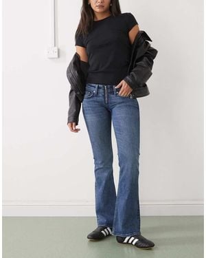 Weekday Low Waist Flared Jeans With Zip Closure - Blue