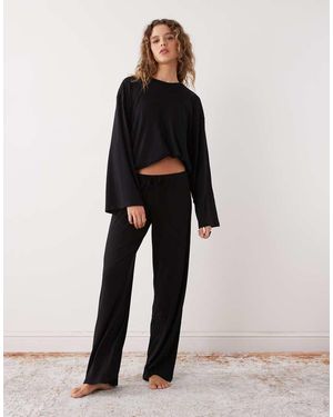 Weekday Pantalones De Estar Por Casa Negros De Talle Bajo Y Pernera Ancha De (Parte De Un Conjunto)