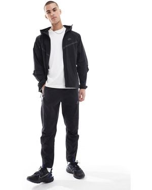 Nike Tech Woven Open Hem Pants - Blue