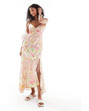 Vero Moda – satin-maxikleid mit schmalen trägern, hohem schlitz und patchwork-blumenmuster - Weiß