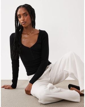 Miss Selfridge – langärmliges henley-oberteil - Schwarz