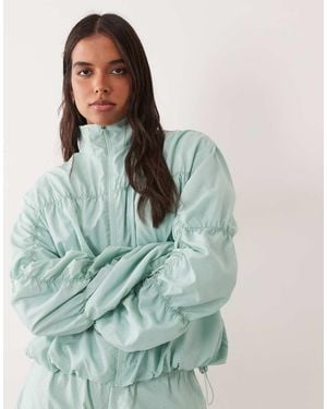 4505 Water Repellent Ripstop Hooded Running Jacket With Ruching Detail - Green