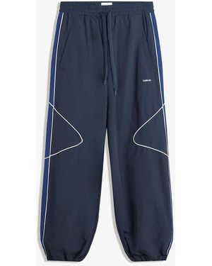 Bershka Super baggy Technical Trousers - Blue
