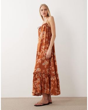 Accessorize Robe longue à fleurs et volants - rouille - Orange