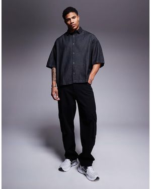 ASOS – kastiges jeanshemd - Schwarz