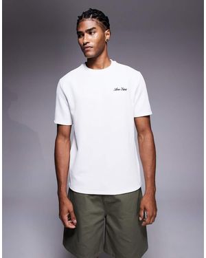 River Island T-Shirt Met Geborduurde 'Ame Saint' Print - Wit