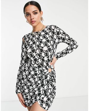 First Distraction The label - robe courte imprimée à manches longues - noir et blanc - Multicolore