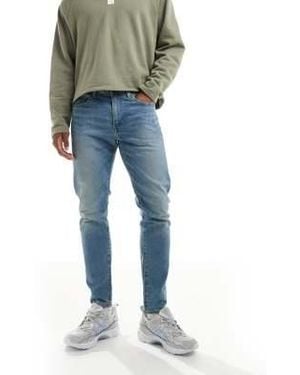 Levi's 512 - jean slim coupe fuselée - délavage vintage clair - Bleu