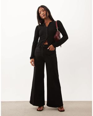 Good American Petite High-rise wide-leg palazzo-jeans - Schwarz