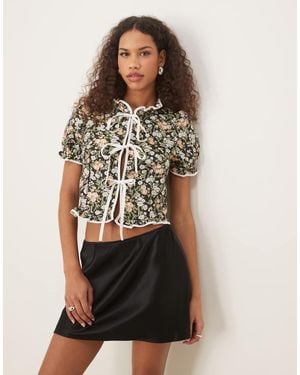 Sister Jane Top Nero A Fiori Con Fiocchi A Contrasto - Multicolore