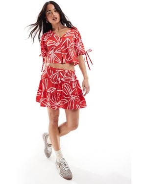 Wednesday's Girl Bold Bloom Print Mini Skirt - Red