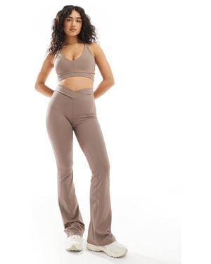 Nike Zenvy Dri-fit Ribbed Cut Out High Waisted Flares - White