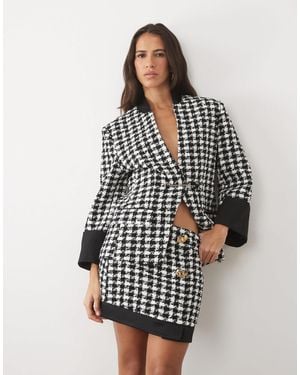 ASOS Oversize-minirock mit hahnentrittmuster, zierknöpfen und kontrastierendem saum - Mehrfarbig