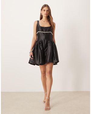 Amy Lynn Babydoll Mini-Jurk Met Siersteentjes En Naaddetail Op De Heup - Naturel