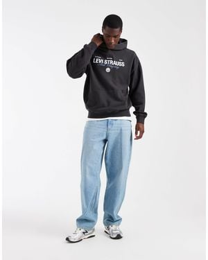 Levi's Sweat à capuche avec imprimé coucher - Bleu
