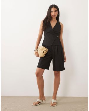 Mango Combinaison ajustée nouée à la taille - Noir