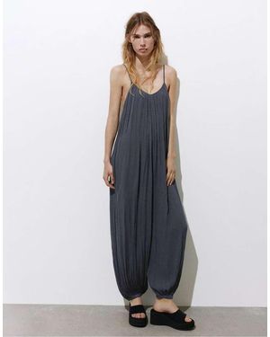 Pull&Bear Soepelvallende Sarouel Jumpsuit Met Bandjes - Blauw