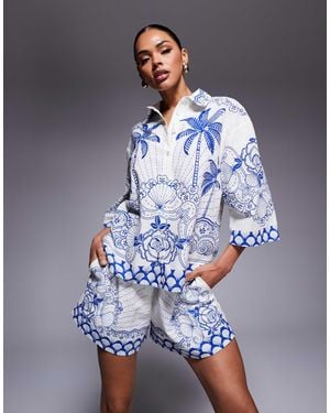 River Island Riviera - short à enfiler avec imprimé - Bleu