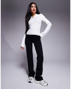 The Couture Club Sculpting Stretch Emblem Flare Leggings - Blue