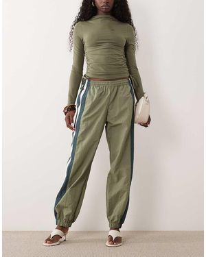 Lioness Aniston Pantalones Cortavientos De Nailon Con Detalle De Raya Lateral En-Verde