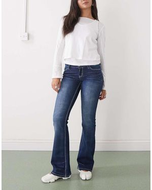 Cheap Monday Vaqueros Elásticos De Talle Bajo Corte Bootcut Con Lavado Y Detalles Bordados En La Parte Trasera Booty Bei De - Azul