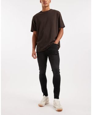 ASOS – spray-on-jeans aus power-stretch-denim - Schwarz