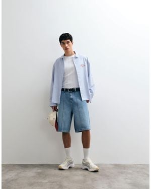 ASOS Bermuda ample long avec plis nervurés - moyen délavé - Bleu