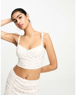 NA-KD Crop top d'ensemble avec bretelles à nouer et imprimé tulipes s - Rose