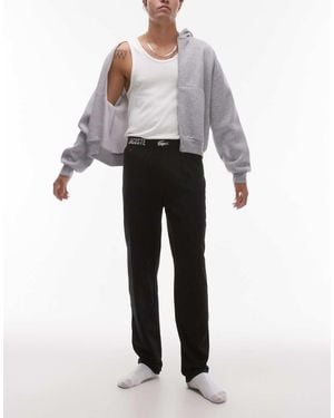 Lacoste Pantaloni Da Casa Neri Con Fascia - Bianco