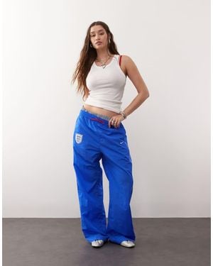 Nike Football Euro 2025 England Woven High Waisted Trousers - Blue