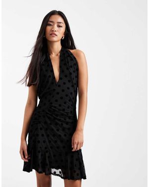 Collusion Zwierige Geflockte Mini Jurk Met Gekruiste Halternek Met Stippen - Zwart