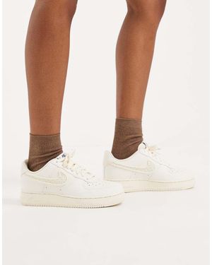 Nike Air Force 1 Trainers With Swoosh Detail - Natural