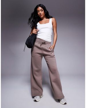 Nike – phoenix – fleece-jogginghose - Lila