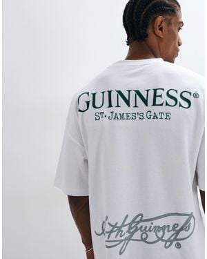 ASOS Oversize-t-shirt mit guinness-print - Grau