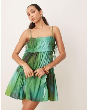 ASOS Robe babydoll courte à imprimé flou et ourlet volanté - vert