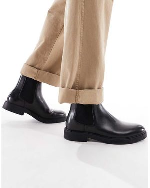 schuh Botas Chelsea Negras Con Puntera Redonda De Cuero Dice De -Negro